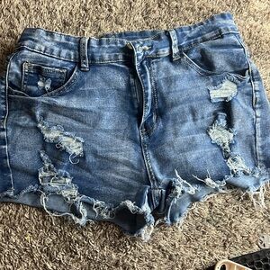 I am selling blue denim jeans shorts that are a size L